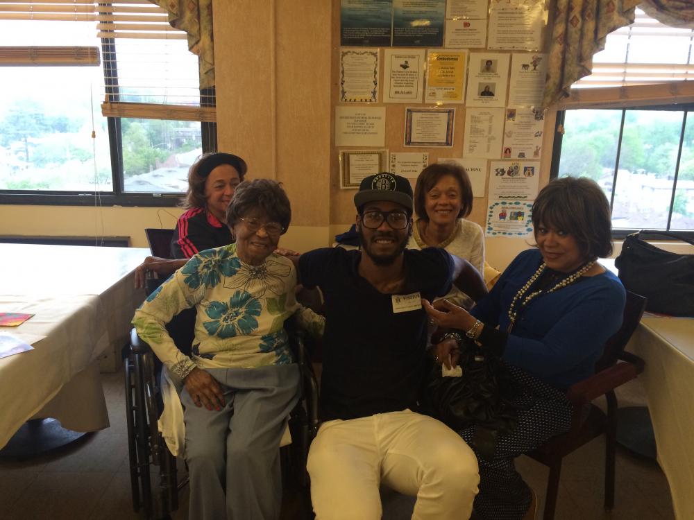 Aaronfront and center with his Great grandma an family!